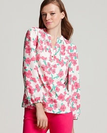 Casual workweek looks get a vibrant punch with this billowy Lilly Pulitzer floral blouse.