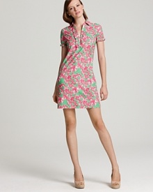 Feminine accents and a lovely butterfly print imbue this polo-inspired Lilly Pulitzer dress with ladylike charm.