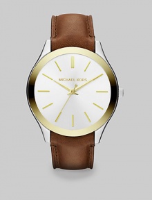 Elegant and understated, in stainless steel with goldtone accents, a sleek dial and a rich luggage leather strap.Quartz movementWater resistant to 10 ATMStainless steel and goldtone round case, 38mm diameter (1.5)Polished bezelLight champagne dialGoldtone bar hour markersSecond handLeather strapImported