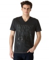 Dressing on the straight and narrow all the time. Get crooked with this graphic tee from Calvin Klein.