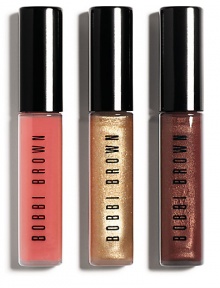 Shimmer, sparkle and shine. Bobbi's Lip Trio, is here in three beautiful shades and textures. Wear each shade alone for a quick pop of color or layer over lipstick for extra shine. Shades: Kir Sugar Shimmer, Gold Glitter Lip Gloss and Bright Pink Lip Gloss 