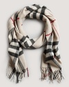 Stay warm in style with this luxe cashmere scarf from Burberry.