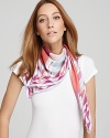 A soft silk twill scarf with a dynamic pattern of geometric and organic shapes.