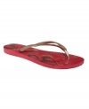 Dream of wildflowers. A flowery footbed spices up these classic rubber flip flops by Havaianas.