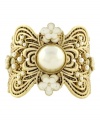 Lovely in lace. Jessica Simpson's intricate cuff bracelet combines elegance with a vintage aesthetic. Crafted in gold tone mixed metal with pretty simulated pearls and ivory resin flowers. Approximate diameter: 2-1/2 inches.