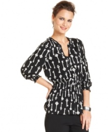 Add a pop of print to your fall wardrobe with this key emblazoned Alfani top -- pair it with all your fave pants!