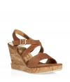 Bring 1970s-inspired style to your look with these luxe suede sandals from Salvatore Ferragamo - Front strap, crisscross ankle strap with buckle closure, cork wedge heel - Pair with a diaphanous floral dress and a sunhat