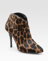 Playful leopard-print calf hair with a patent leather trim and an ultra-skinny heel. Self-covered heel, 4 (100mm) Calf hair upper Back zipper Leather lining and sole Padded insole Pattern may vary Made in ItalyOUR FIT MODEL RECOMMENDS ordering one half size up as this style runs small. 