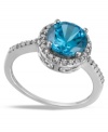 Blue perfection. B. Brilliant's pretty cocktail ring features a large, round-cut London blue cubic zirconia encircled by smaller, round-cut clear cubic zirconias (5-1/5 ct. t.w.) Set in sterling silver. Size 7.