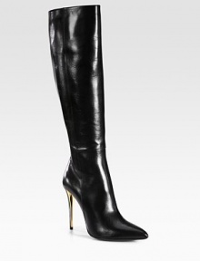 Instantly sleek point toe silhouette of fine leather, elevated with a goldtone high heel. Lacquer and leather-covered heel, 4¼ (110mm)Shaft, 17Leg circumference, 14¼Leather upperSide zipperPoint toeLeather lining and solePadded insoleMade in ItalyOUR FIT MODEL RECOMMENDS ordering one size up as this style runs small. 