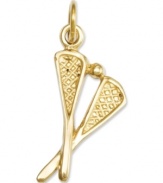 A total catch! This sporty charm includes two traditional lacrosse sticks and a lacrosse ball in polished 14k gold. Chain not included. Approximate length: 1 inch. Approximate width: 2/5 inch.