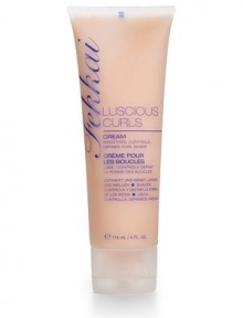 Luscious Curls Enhancing Cream, a frizz-fighting styling lotion, is made specifically to enhance and sculpt curls on naturally curly, wavy or permed hair. Formulated with honey nectar and ginseng, it adds elasticity and shape to create sexy, sought-after spirals. 4 oz. Made in USA. 