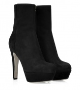 Ultra-luxe booties of soft black suede creates a sleek silhouette - Features a stylish, platform sole and a sturdy heel - Concealed side zip - Gives the illusion of a sexy, long leg - Make an edgy statement with a cocktail dress, pencil skirt, or slim jeans