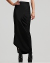 The long skirt gets a remake with this Patterson J. Kincaid maxi designed with draped pleats and seam detail for minimalist chic. Boasting an asymmetric hem, the modern silhouette flaunts a directional edge--work it with moto-boots and tough-luxe accents.