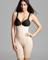 Go undercover with the SPANX Slim Cognito Mid-Thigh Bodysuit. This shaper comfortably shapes problem areas, accentuates your waistline, minimizes your tummy and thighs, lifts your rear, and makes inches seem to disappear. The detachable straps attach to your bra to keep the bodysuit in place and allow you to wear the bra that's best for you - and your outfit. And to avoid the flat, uni-butt look that many shapers give your backside, Slim-Cognito offers The Great Divide. You won't feel the subtle butt separator, but the natural perky shape won't be lost on those in your wake. Style #067