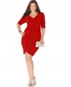 Ravishing ruching lends a flattering silhouette to the elbow sleeve plus size dress by Trixxi.