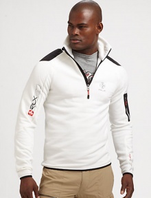 Constructed in a breathable stretch fleece, a half-zip mockneck jacket makes a sporty statement with woven patches and printed logo graphics.Half-zip frontStand collarZippered pocket at sleeve53% polyester/38% nylon/9% elastaneMachine washImported