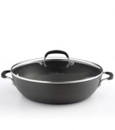 Your go-to in the kitchen! A hard-anodized exterior and nonstick interior provides the perfect space for sauteing, simmering, browning and preparing entire meals. Even faster clean-up and even smarter, healthier cooking is all yours with the versatility of this do-it-all pan. 10-year warranty.