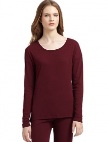 THE LOOKRoundneckPullover styleLong sleevesLonger curved back hemTHE FITAbout 24 from shoulder to hemTHE MATERIALCotton/rayonCARE & ORIGINMachine washImported