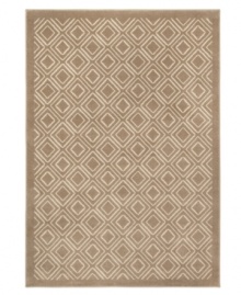 A geometric diamond design in neutral colors creates a lasting impact in this Tribecca rug. The streamlined, low pile construction gives it a soft and durable finish. (Clearance)