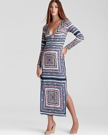 An instant closet standout, Mara Hoffman's column dress lends an effortless look that stands on its own--a timeless print feels cultured and cool.