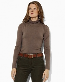 Graceful dolman sleeves and an elegantly draped cowl neckline lend chic modern touches to a classic jersey-knit sweater in soft merino wool.