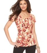 In a fiery abstract print, this ruched Alfani top adds a splash of bold color to any outfit!