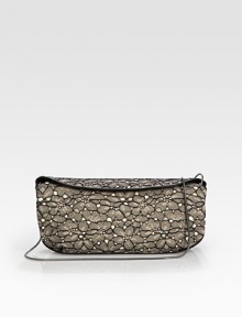 Elegant St. Gallen lace design finished with leather trim. Removable chain shoulder strap, 20 dropMagnetic flap closureTwo inside compartmentsOne inside zip pocketLeather lining11¾W X 5¾H X 2¾DImported