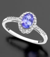 Color your look with happiness. This beautiful ring features oval-cut tanzanite (1/2 ct. t.w.) and round-cut diamond (1/10 ct. t.w) set in 14k white gold.