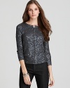 Throw on this shimmering sequined C by Bloomingdale's cardigan for a glamorous quick-fix any day of the week.