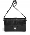 Luxurious black bag with adjustable shoulder strap - This bag is the ultimate in luxury with supple calf leather and lizard accents - Slim and sleek shape with adjustable shoulder straps and a snap lock closure - Pair with a dress and stockings for a chic cocktail look - Add edge with leather leggings, an oversized sweater and a biker jacket