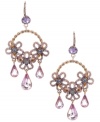 Flowers that will last forever. Betsey Johnson adds a magical touch to traditional hoop earrings with pink and purple-hued crystal flowers and a chic, twisted design. Crafted in antique gold-plated mixed metal. Approximate drop: 2-3/4 inches.