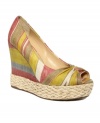 A touch of retro gold, these Goldie wedges from Report bring hippie-chic with espadrille detail and a colorful fabric finish. Pair with a floral sundress for instant style.