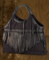 Denim & Supply Ralph Lauren's slouchy, oversized canvas tote gives a stylish touch to an everyday look with leather straps and bohemian-inspired fringe detailing.