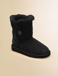 To cuff or not to cuff, that is the question posed by this short, convertible sheepskin style with one big wood button. Sheepskin upper with raw edge Logo button-and-loop closure Sheepskin lining EVA sole with foam cushioning Logo tab on heel Imported