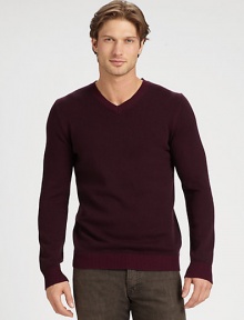 The perfect option for transitional weather, this versatile v-neck, shaped in a luxurious wool and cashmere blend, can be worn alone, or layered, as those cold weather days approach.V-neckRibbed collar, cuffs and hem70% wool/30% cashmereHand washImported