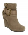 The perfect complement to skinny jeans and leather jackets. Find your edge with the sexy Parker wedge booties by DKNYC.