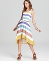 A lightweight Design History striped dress flaunts fresh color and a high/low silhouette for a dose of stylish delight as spring's warmth arrives.