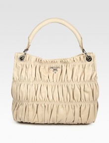 Ruched gaufre nappa leather crafted in a roomy top-handle carryall.Top handle, 6½ dropTop snap closureProtective metal feetOne inside zip pocketThree inside open pocketsPrada logo lining13½W X 11H X 6DMade in Italy