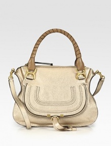 EXCLUSIVELY AT SAKS in Metallic Beige. Shimmering metallic calfskin leather covers this versatile shape, accented with elegantly-wrapped top handles in a contrasting tone. Double tennis-wrapped top handles, 6 dropShoulder strap, 18 dropTop zip closureHidden pocket under flapOne inside zip pocketOne inside open pocketCotton lining14½W X 10¾H X 4½DMade in Italy