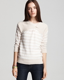 This luxe MARC BY MARC JACOBS sweater puts weekend chic at your fingertips. The bright, creamy hue and unique twist collar exudes elegant ease.