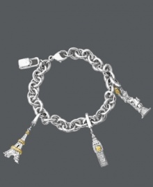 The perfect gift for the lady who loves to travel. This adorable charm bracelet features a rolling travel bag, the Eiffel Tower, Big Ben, and the Statue of Liberty. Crafted in sterling silver with 14k gold accents and sparkling, round-cut diamonds (1/10 ct. t.w.). Approximate length: 7-1/2 inches.