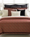 Lauren by Ralph Lauren's Bleecker Street-inspired duvet cover creates a distinctly rich ambiance. Features a deep red paisley pattern and black velvet ribbon frame on the front. Reverses to solid; top hidden button closure.