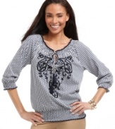 A peasant top gets revamped with a punchy print and paisley embroidery in this Charter Club look. Tassels at the neckline add a luxe touch, too! (Clearance)