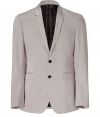 Bring classic elegance to your workweek look with this sophisticated blazer from Burberry London -Notched lapels, two-button closure, front flap pockets, back vent - Style with slim trousers, a sleek button down, and dress shoes