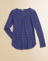 Fresh stripes on cozy waffle knit gets a little extra shaping from soft pleats at the neckline and a gracefully curved hem.Scoop neckline with soft center pleatsSolid shoulder insetsLong sleevesCurved hemPolyester/cotton/micromodalMachine washImported