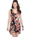 Garden party style gets a trend-right upgrade with this asymmetrical babydoll dress from Material Girl!