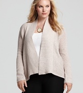 Slip on this slouchy Eileen Fisher shawl collar cardigan when you're running errands or to a meeting--the versatile and warm silhouette works well with everything from denim to a sleek pencil skirt.