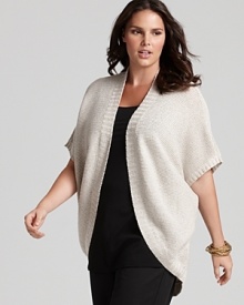 The relaxed, open styling of this Eileen Fisher oval linen cardigan lends itself to layering, topping your closet favorites with luxe lightweight warmth.