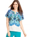 Get into vacation mode with this tropical-inspired petite top from Style&co.! A bright graphic print and relaxed fit makes this a fun piece!